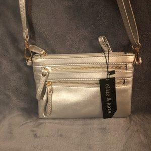 Brand new Ellie and Kate crossbody wristlet silver